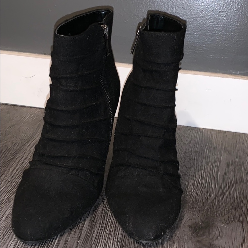 Black ruffled ankle boots